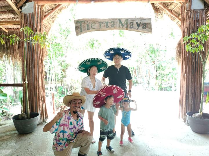 Family in charro sombreros, kids holding sombreros