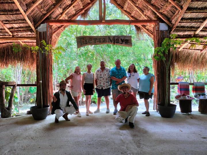 Group of eight with two guides kneeling