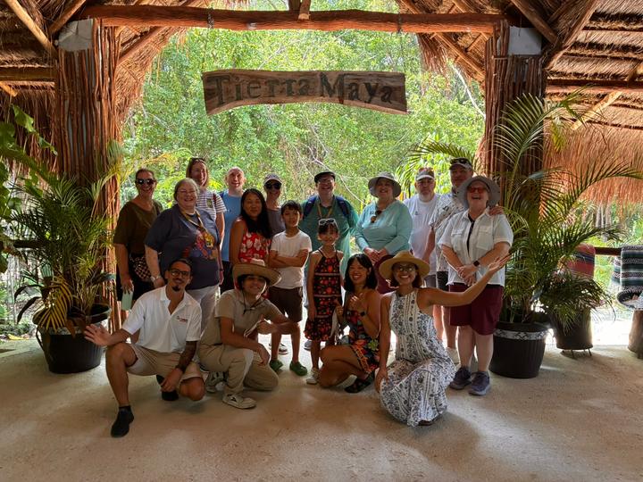 A group of about 18 with two guides in front